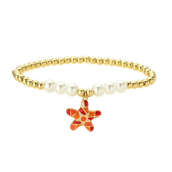 Pulseras chapadas en oro con incrustaciones de perlas de cobre y cola de pez de estrella de mar de playa