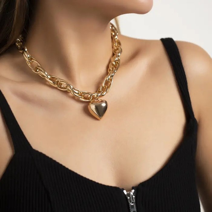 Ensemble de bijoux plaqué or 18 carats avec incrustation de cuivre en forme de cœur de style simple
