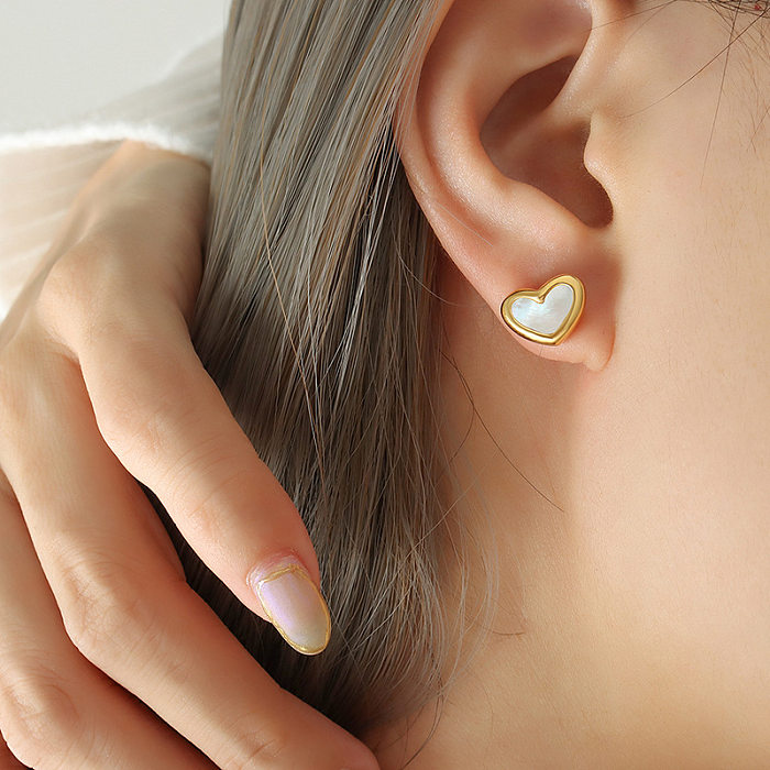Elegante herzförmige Titanstahl-Inlay-Shell-Damenarmbänder, Ohrringe und Halskette