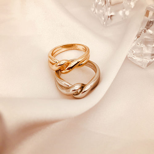 Elegante Lady Commute Round Twist Kupferbeschichtung vergoldete Ringe