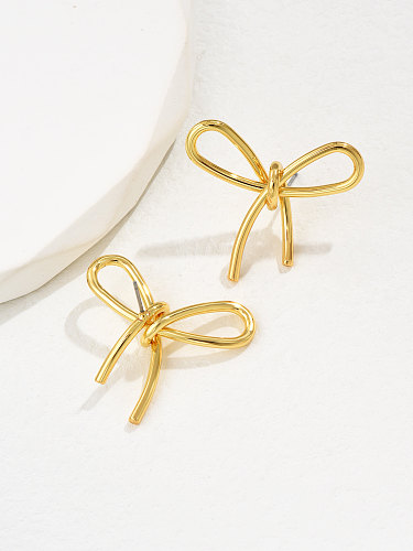 1 paire de clous d'oreilles en cuivre avec nœud papillon de Style français pour femme élégante