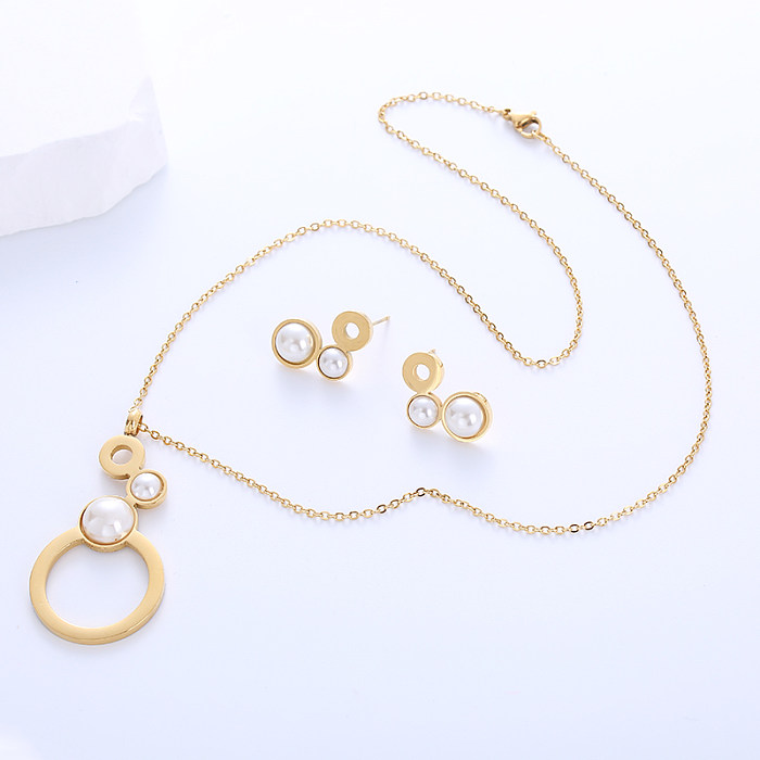 Collar de pendientes chapado en oro de 18 quilates con incrustaciones de perlas artificiales redondas de acero inoxidable de estilo Simple lujoso