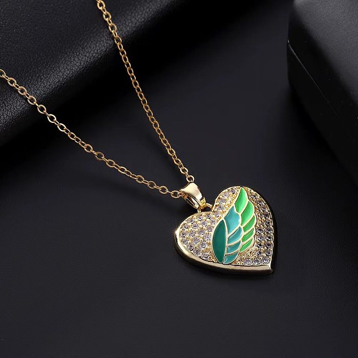 Collier pendentif en pierres précieuses artificielles, Style classique, en forme de cœur, avec incrustation de cuivre