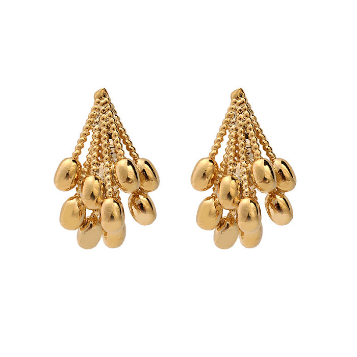 1 par de aretes de cobre chapados irregulares de grano de borla de estilo simple