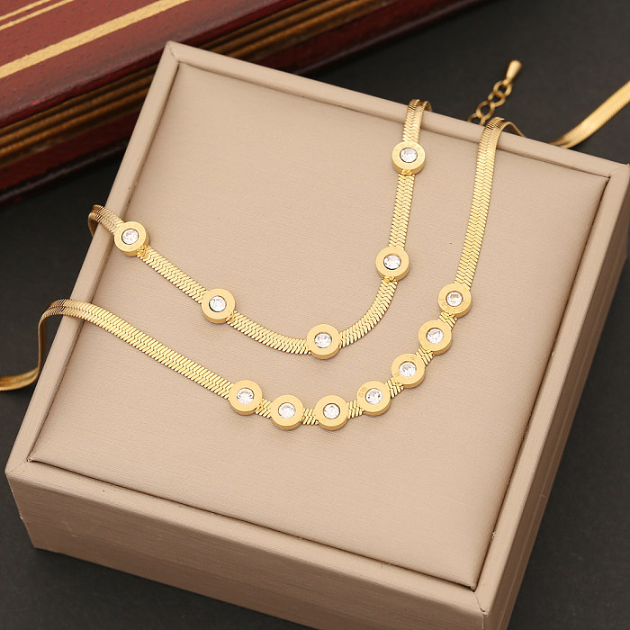 Elegante Damen-Armband-Ohrringe-Halskette mit runder Edelstahl-Beschichtung und Inlay-Zirkon-Design