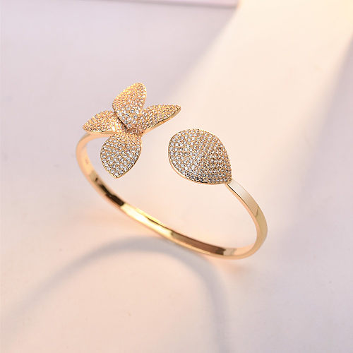 El oro dulce del cobre 18K de la flor del estilo del INS plateó las pulseras de los anillos del Zircon a granel