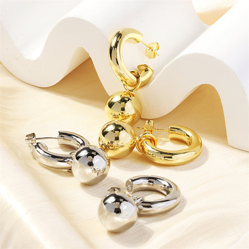 1 paire de boucles d'oreilles pendantes en forme de C exagérées en cuivre plaqué or 18 carats