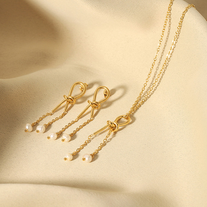 Collar de pendientes chapado en oro de 18 quilates chapado en acero inoxidable con nudo de lazo de estilo simple y elegante