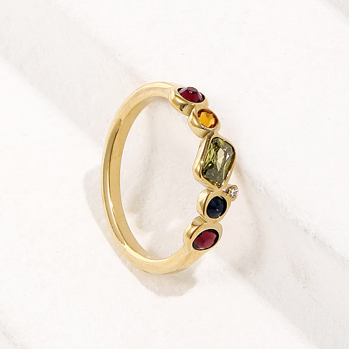 Einfacher Ring aus 14-karätigem Gold mit Titanstahl und eingelegtem farbigem Zirkonium
