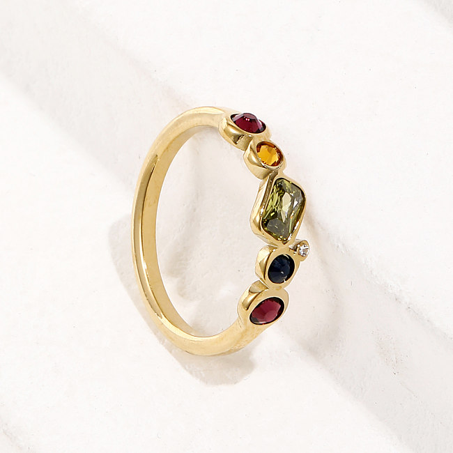 Einfacher Ring aus 14-karätigem Gold mit Titanstahl und eingelegtem farbigem Zirkonium