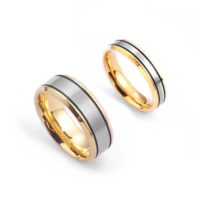 مصنع توريد المجوهرات المباعة عبر الحدود الشركة المصنعة للزوجين خواتم الزوجين من التيتانيوم الصلب لغرفة الموضة خاتم ذهبي هدية Qixi