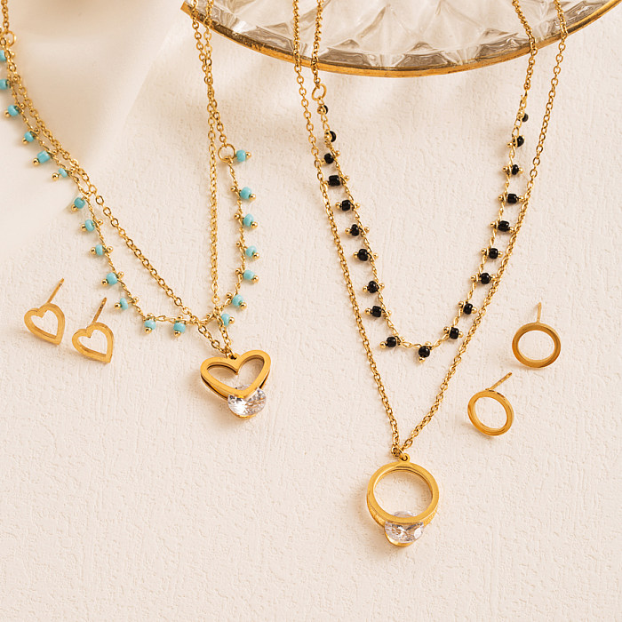 Großhandel elegante runde Herzform Edelstahl vergoldet Zirkon Ohrringe Halskette