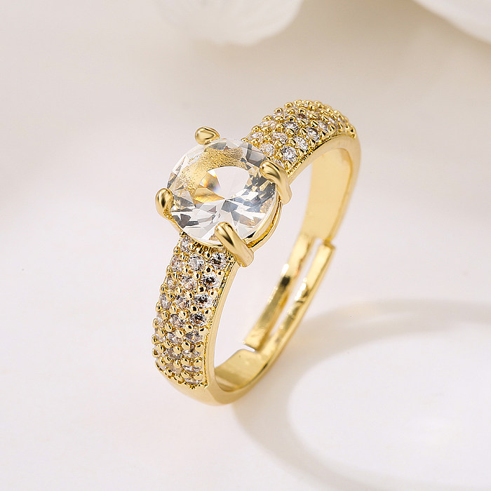 O ouro oval básico da forma do coração do estilo do INS cobre 18K chapeou anéis do zircão no volume