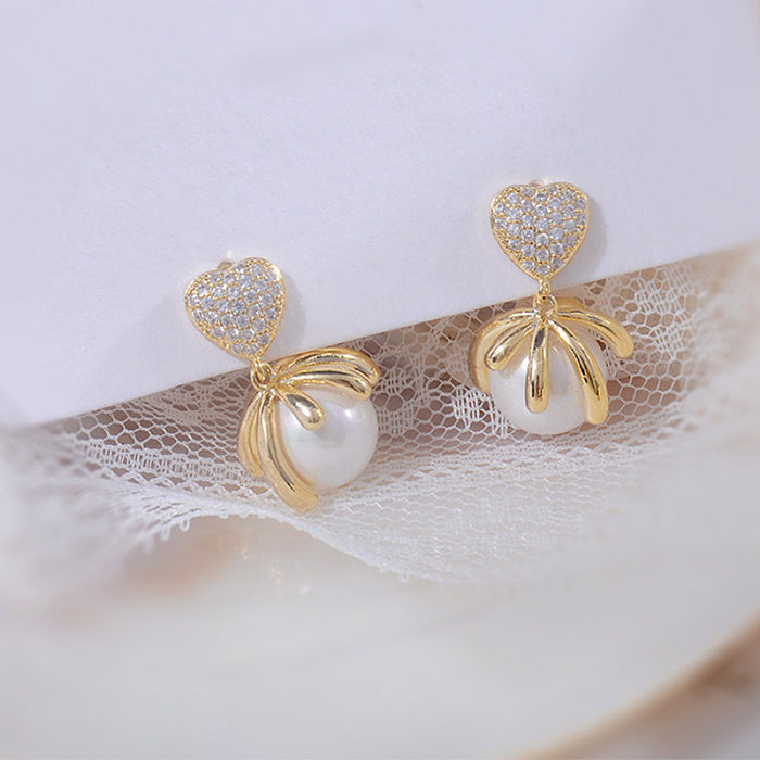 1 paire de boucles d'oreilles élégantes en forme de cœur, incrustation d'imitation de perle en cuivre et Zircon plaqué or 14 carats
