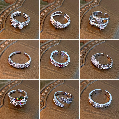 Lässiger, schlichter, herzförmiger offener Ring mit Kupferbeschichtung und Inlay aus Perlen und Zirkon