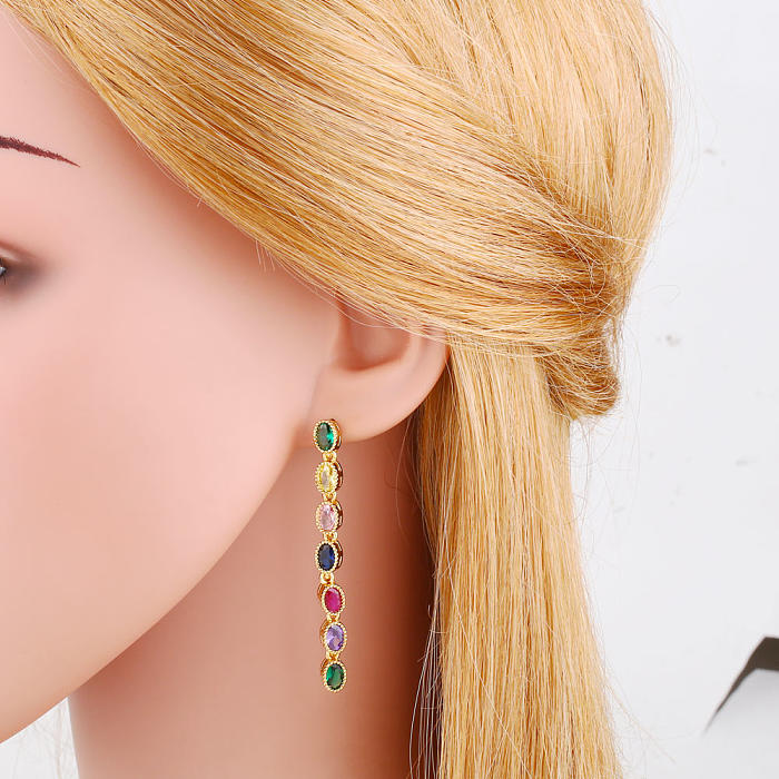 1 paire de boucles d'oreilles pendantes en Zircon avec incrustation de cuivre et pampilles ovales à la mode
