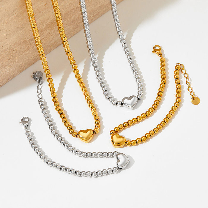 Collier de bracelets de placage de perles en acier inoxydable en forme de cœur de style simple