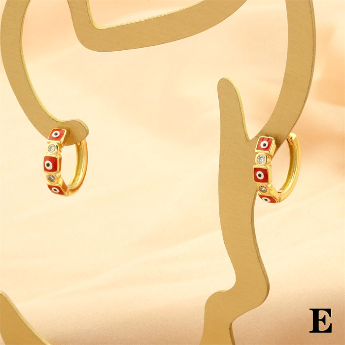 1 paire de boucles d'oreilles plaquées or 18 carats, Style Simple, œil du diable, incrustation de cuivre et de Zircon