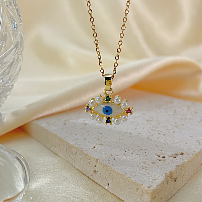 Vintage Style Devil'S Eye Titanium Steel Copper Inlay Artificial Pearls Zircon Pendant Necklace