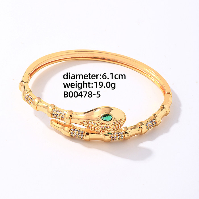 Lässiges, glamouröses Schlangen-Kupferbeschichtungs-Inlay-Zirkon-vergoldetes Ring-Armband-Schmuckset