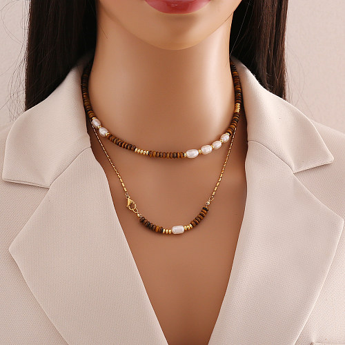 Elegante Pendler-Halskette mit geometrischen Perlenarmbändern und Ohrringen aus Edelstahl
