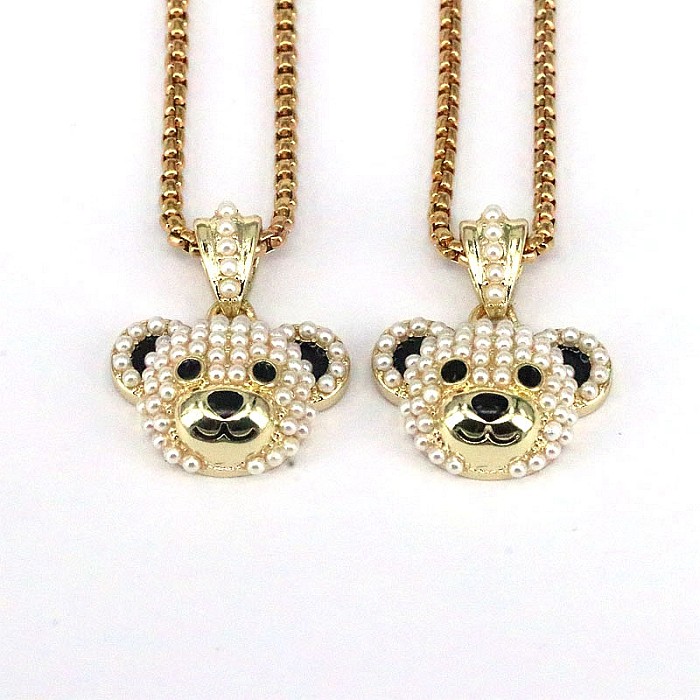 Modische kleine Bären-Anhänger-Halskette mit Kupferbeschichtung und Inlay-Perlenvergoldung