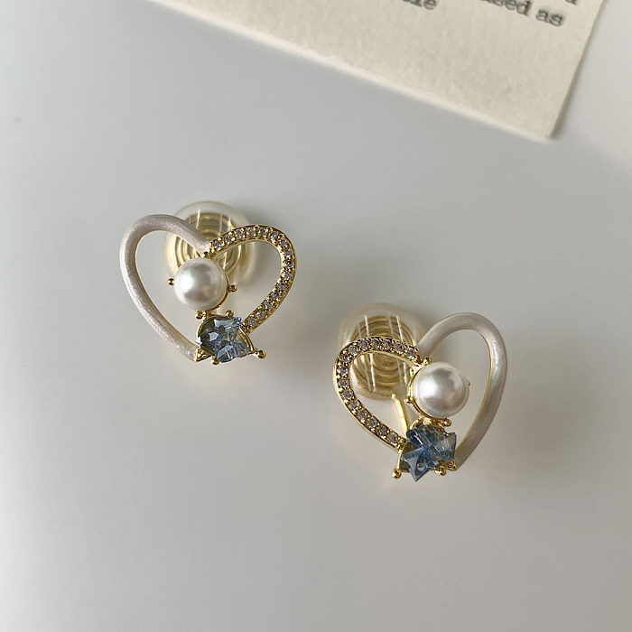 1 paire de blocs de couleurs douces, incrustation de placage en forme de cœur, perles artificielles en cuivre, manchettes d'oreilles en Zircon