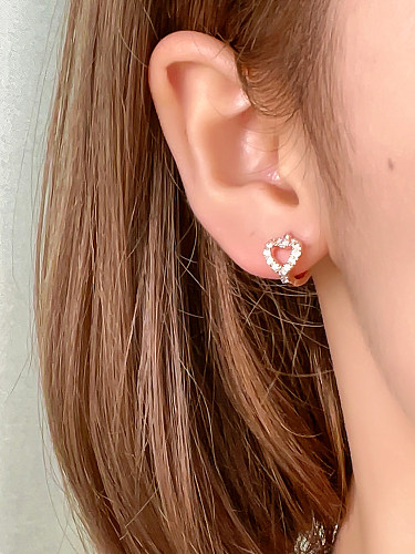 1 paire de clous d'oreilles plaqués en forme de cœur, Style Simple, incrustation en cuivre Zircon plaqué or Rose, plaqué or blanc