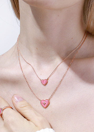 Collier pendentif en forme de cœur doux avec incrustation de cuivre et coquillage