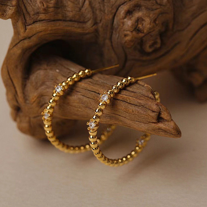 1 par de brincos banhados a ouro com pedras preciosas artificiais de cobre redondo chapeado estilo simples