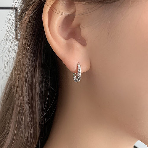 Einfache geometrische ovale Zinnfolie-förmige Ohrring-Ohrclip-japanischer und koreanischer Ohrring temperamentvoller kalter Stil neue Ohrringe
