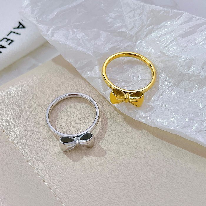 Atacado elegante básico streetwear arco nó de aço inoxidável branco banhado a ouro anéis banhados a ouro