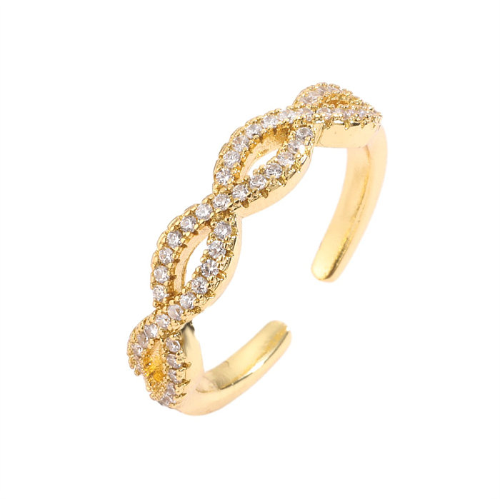 Luxuriöse, unregelmäßige, vergoldete offene Ringe mit Zirkoneinlage und Kupferbeschichtung