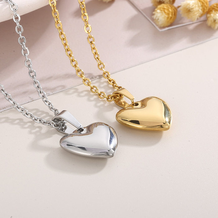 Herzförmige Halskette mit Ohrringen im modernen Stil mit Titanstahlbeschichtung und 18-Karat-Vergoldung