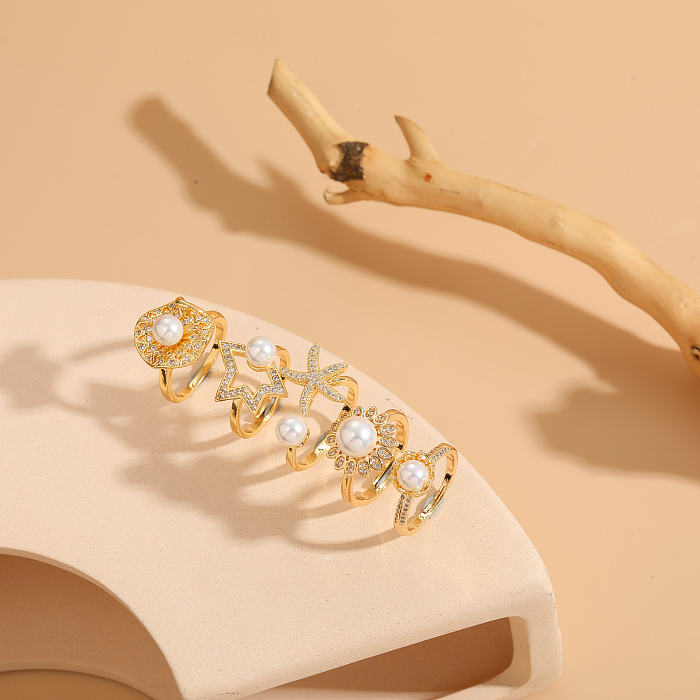 Eleganter, luxuriöser, klassischer offener Stern-Kupfer-Inlay-Zirkon-Ring mit 14-Karat-Vergoldung