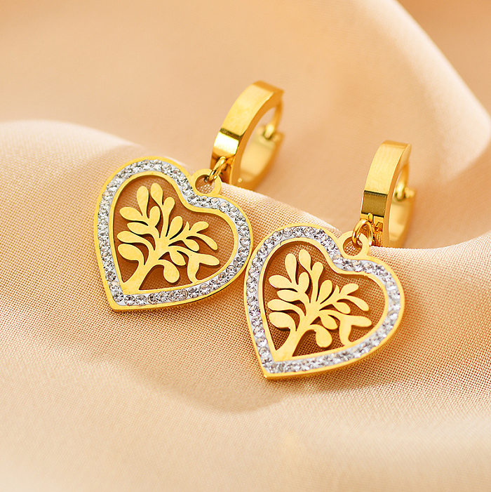 1 Paar lässige vierblättrige Kleeblatt-Ohrringe in Herzform mit Kupferbeschichtung und Inlay aus Zirkon