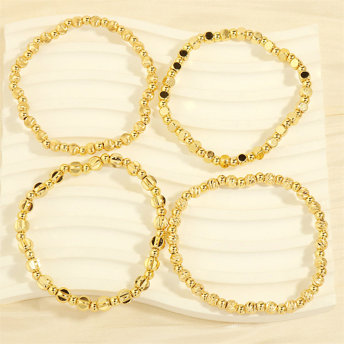 Bracelets plaqués or 18K de placage de cuivre rond de style simple de style IG