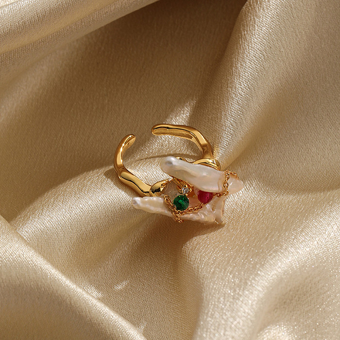 Offene Ringe mit geometrischer Verkupferung und Intarsienperle, 18 Karat vergoldet