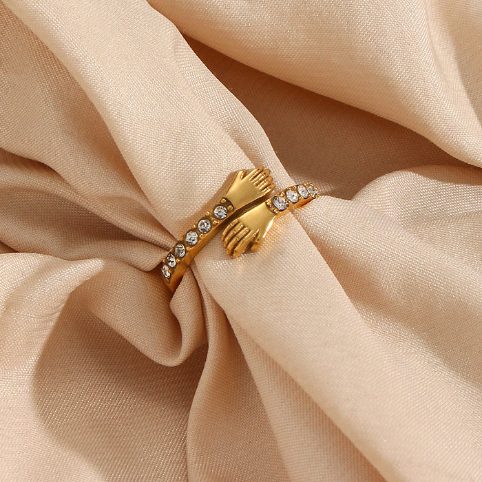 أزياء الفولاذ المقاوم للصدأ الأيدي عناق الزركون خاتم قابل للتعديل