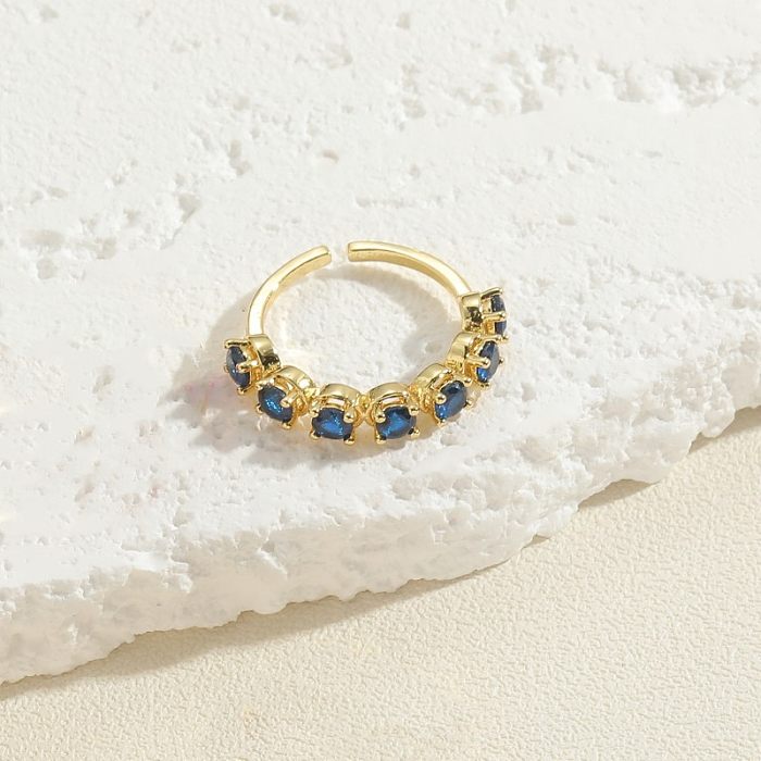 Elegante, runde, mit 14-karätigem Gold plattierte Ringe mit Zirkoneinlage und Kupferbeschichtung