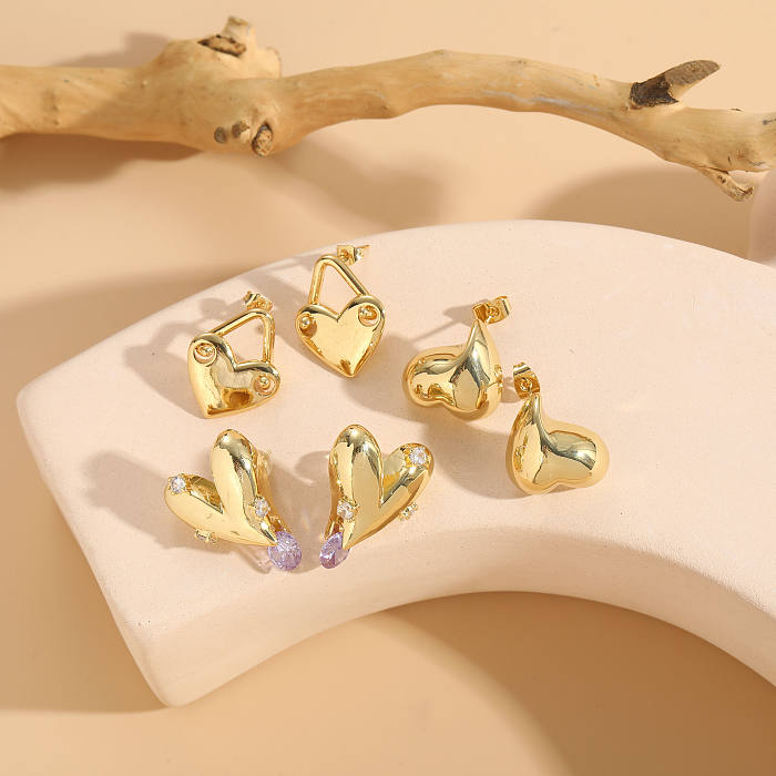 1 Paar elegante, schlichte Herzform-Ohrstecker mit Kupferbeschichtung und Inlay aus Zirkon mit 14-Karat-Vergoldung