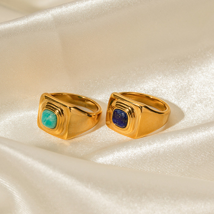 Luxuriöse quadratische Edelstahl-Beschichtungseinlage mit künstlichen Edelsteinen und 18 Karat vergoldeten Ringen