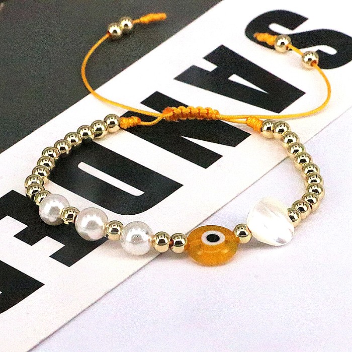 Hip-hop redondo formato de coração olho imitação pérola corda cobre frisado banhado a ouro pulseiras 1 peça