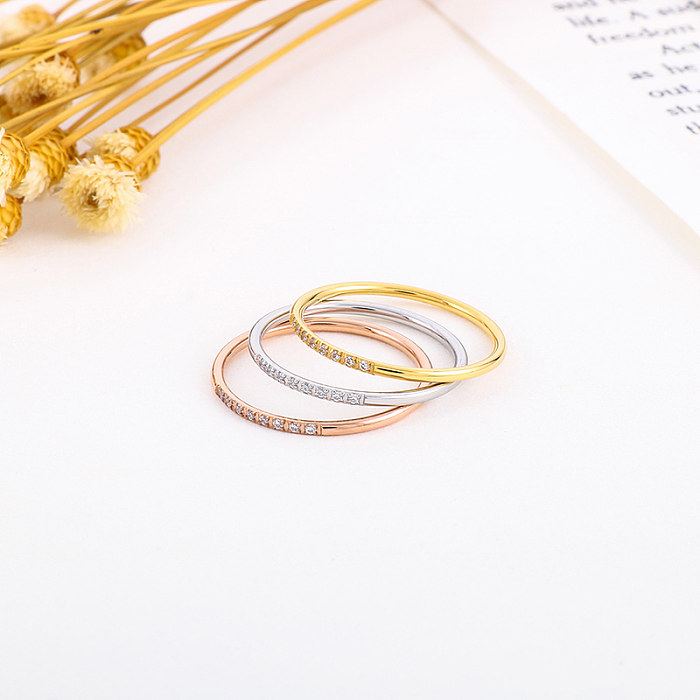 Anéis de strass embutidos de aço titânio de cor sólida estilo simples