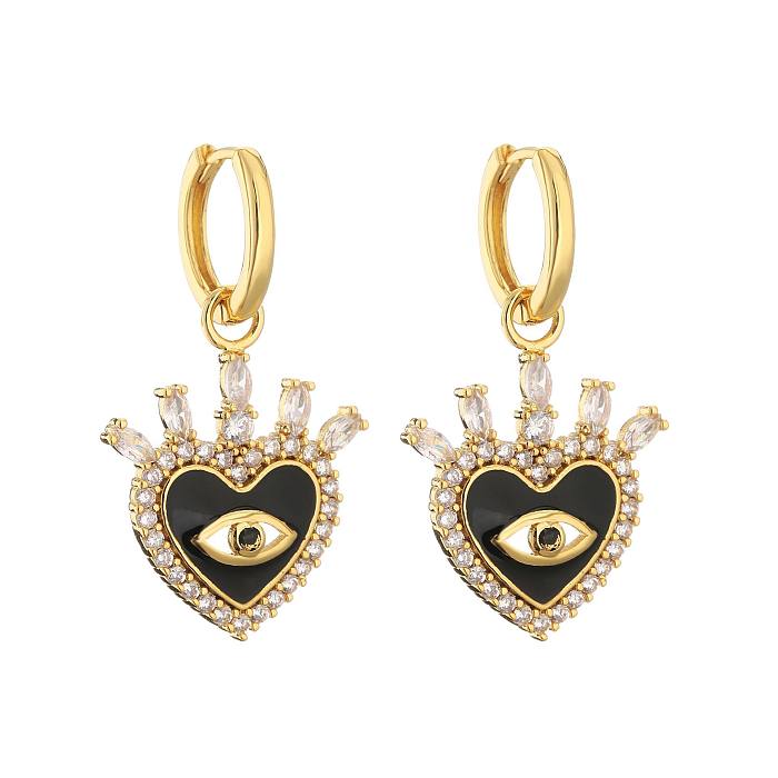 Retro Micro-inlaid Eyes Heart Shape Copper Plated Ear Clip Wholesale jewelry