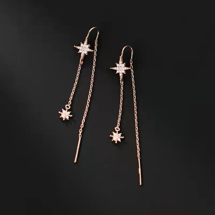 1 par de pendientes de diamantes de imitación de cobre con incrustaciones de estrellas de estilo simple e informal