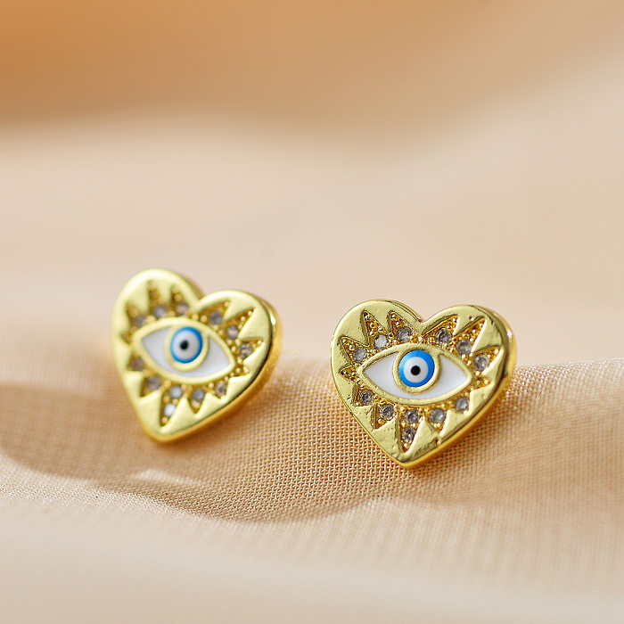 1 Pair Modern Style Devil'S Eye Heart Shape Inlay Copper Zircon Ear Studs