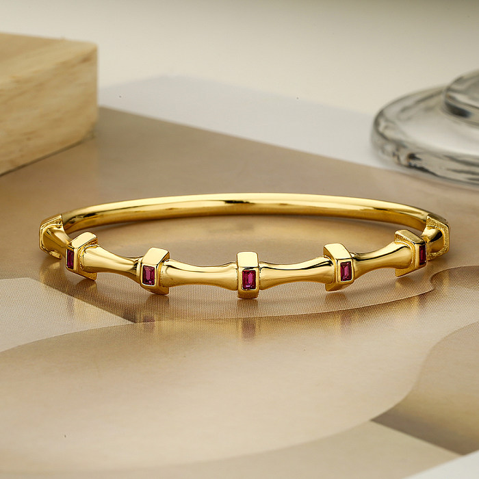 Bracelet plaqué or 18 carats avec incrustation de cuivre carré de style moderne