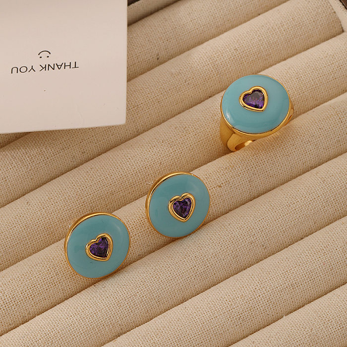 Pendientes de anillos de circonio con incrustaciones de esmalte de cobre en forma de corazón de estilo clásico
