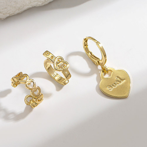 مجموعة واحدة من أصفاد الأذن النحاسية المطلية بالذهب على الطراز الكوري على شكل قلب